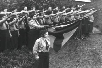 female blueshirts making the fascist salute