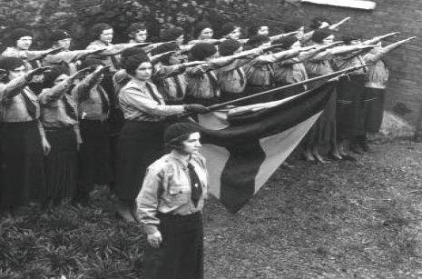 female blueshirts making the fascist salute