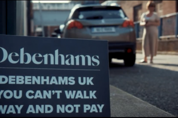 A placard at the Cork demonstration which reads "Demenhams UK you can't walk awayac and not pay"
